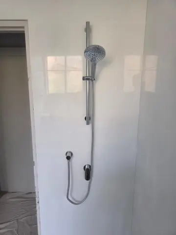 Chrome shower rail and mixer installation